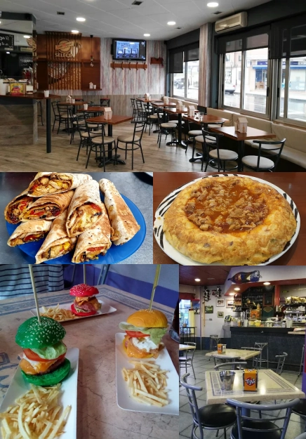 Interior del Café Bulevar en Lugones con platos variados como hamburguesas gourmet, wraps, tortilla y un ambiente acogedor.
